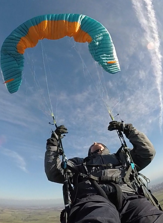 Paraglider wing showing asymmetric collapse — the critical moment ParaBaro detects