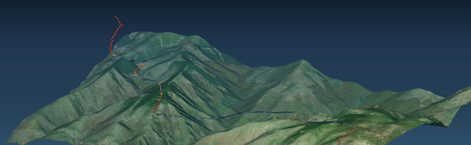 A real cross-country flight drawn over real terrain: a single continuous track threads along a shaded mountain ridge, turning warm where the air was lifting the pilot and cool on the glides between climbs